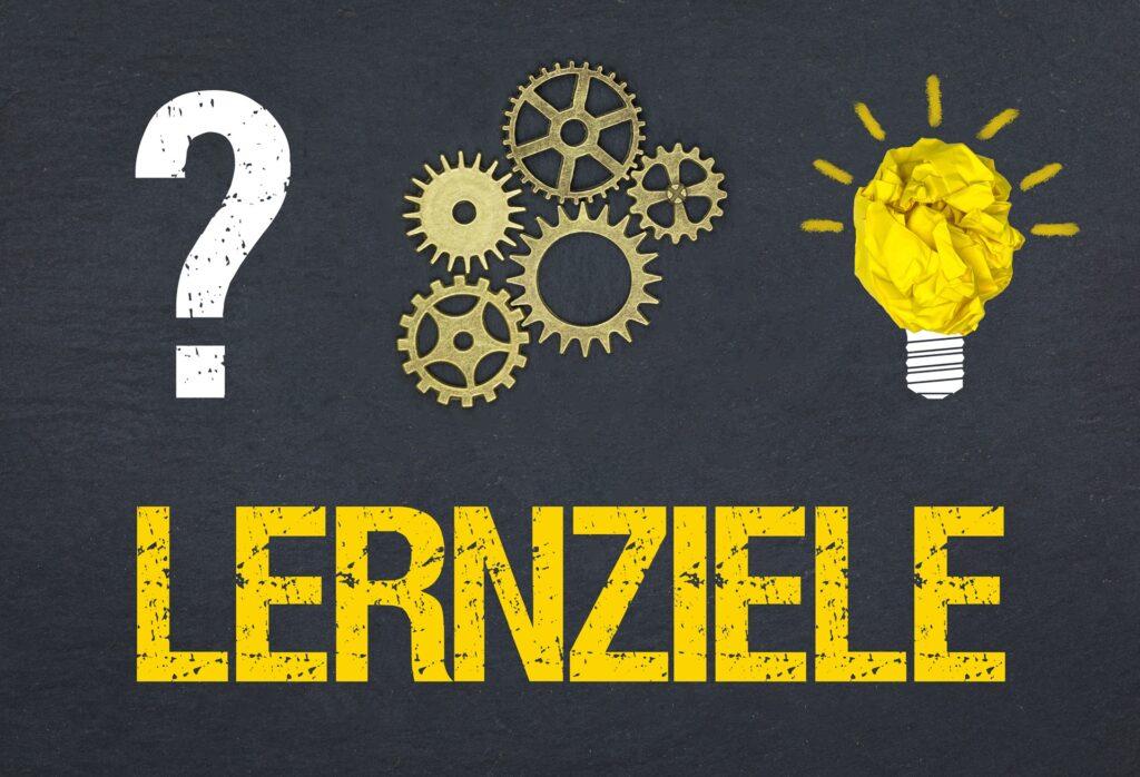 Symbolgrafik mit Lernziele und Zahnrädern | Klassenfahrt München